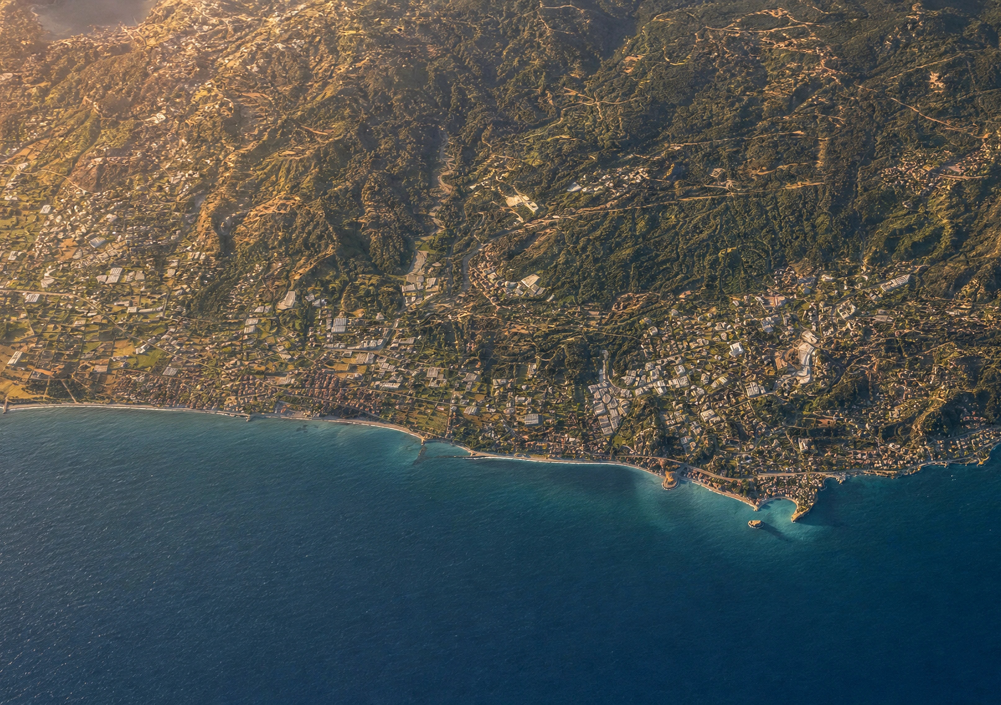 Aerial view of the Okurcalar shore on the Alara coast, with the mountains behind it